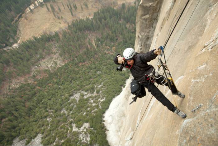 slr camera cliff climber photography