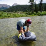 Dunking Backcountry Bed Elite Sleeping Bag In River