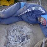 lee-sleeping-around-campfire