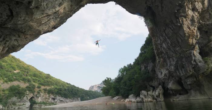 Watch Out Below! Chris Sharma Deep-Water Solos Massive Arch