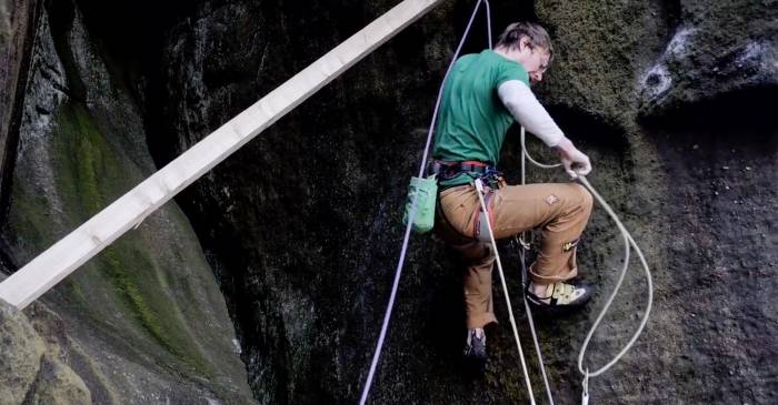 climber uses wood for protection