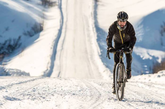 Winter Cyclist crushing uphill