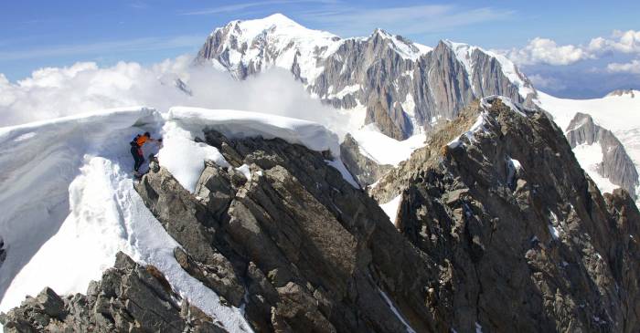 Watch Dani Arnold Speed Climb 4000-foot Grandes Jorasses Ropeless