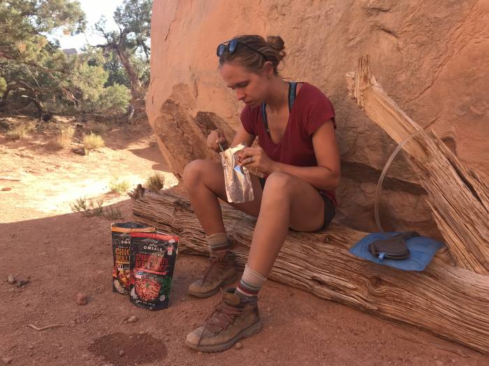 eating Omeals backpacking meals in Canyonlands