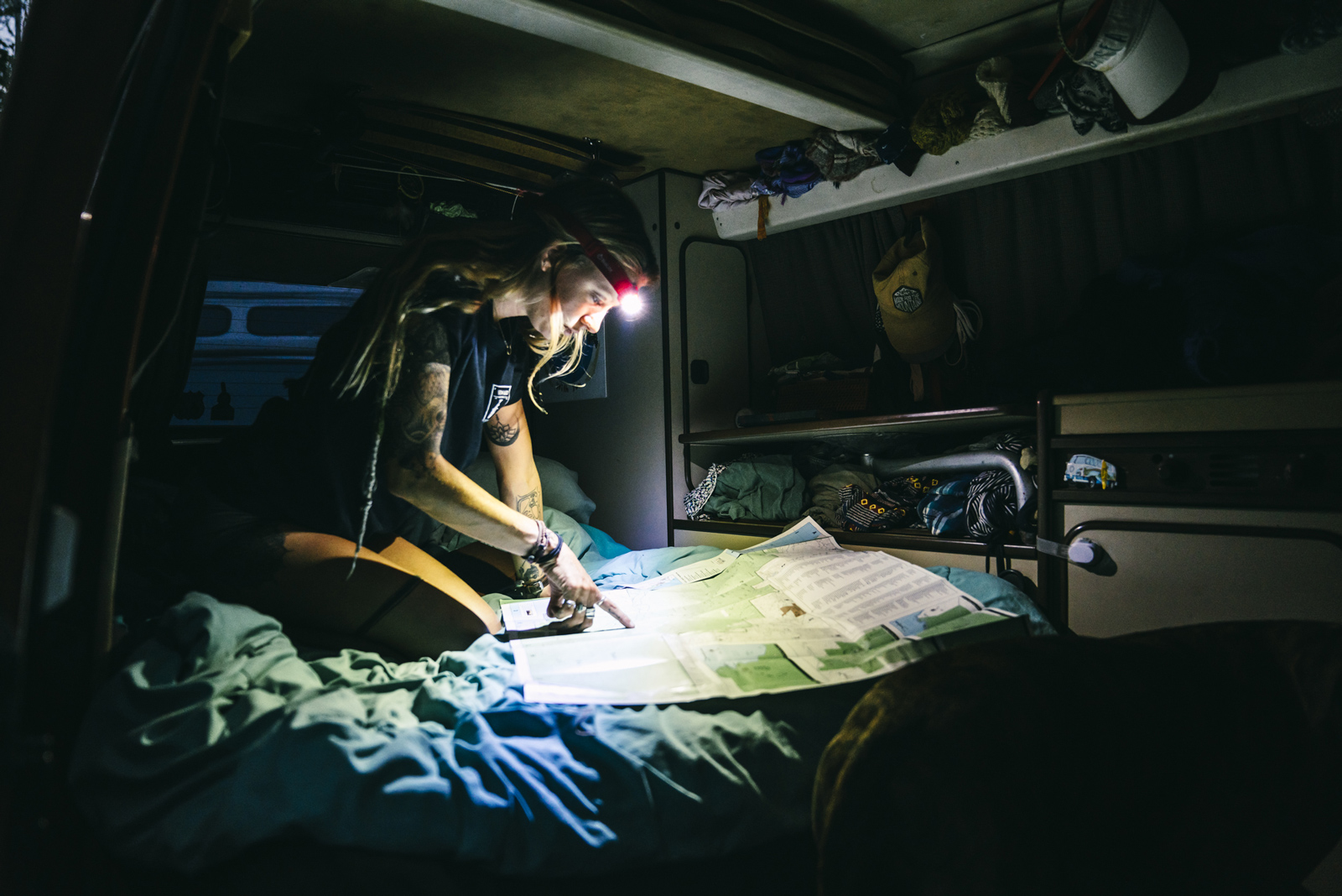 Woman illuminating map with the BioLite Headlamp 330
