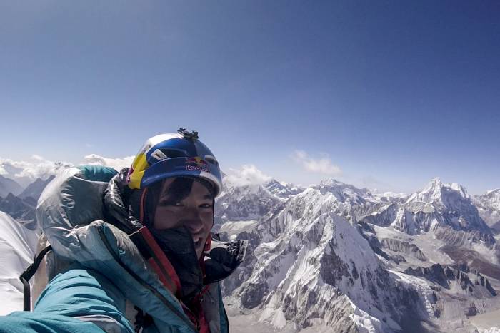 david lama on the summit of lunag ri