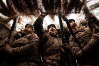 The Best Shotguns for Hunting at Any Budget 3 hunters wearing same brown camo in deer stand