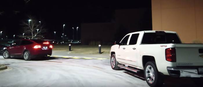 Fed Up: Tesla Sedan Muscles Chevy Truck Out of Charging Station