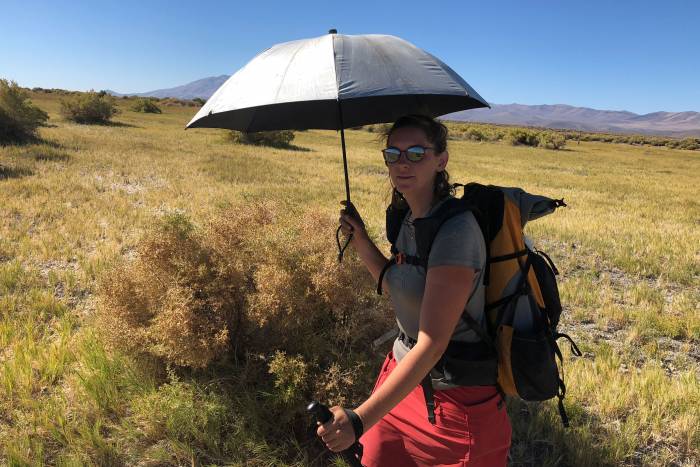 Hiker with umbrella