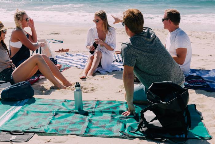 People hanging out on the beach