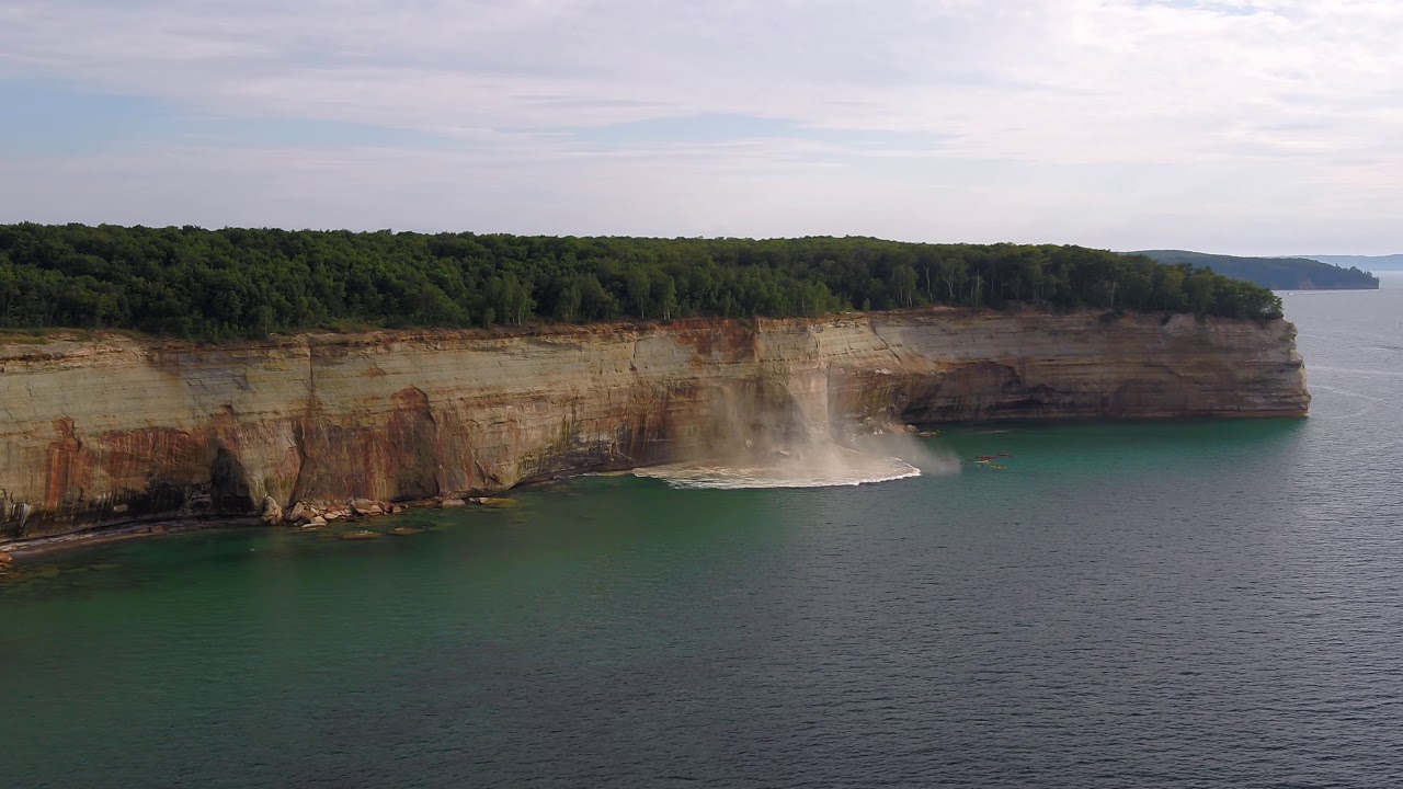 Close Call: Kayakers Nearly Crushed by Cliff Collapse