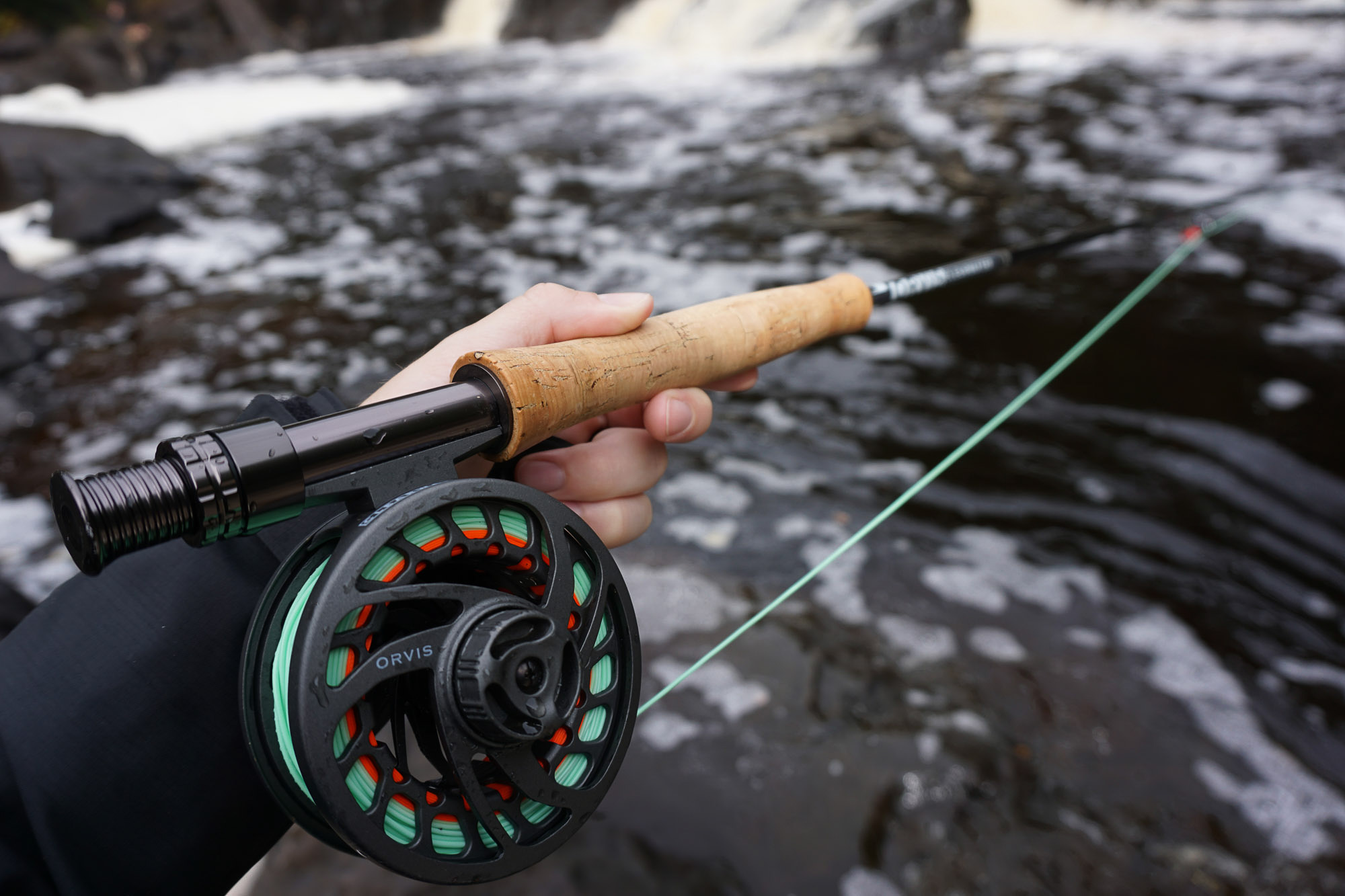 Holding Orvis Clearwater Fly Fishing Rod and Reel Holding Orvis Clearwater Fly Fishing Rod and Reel