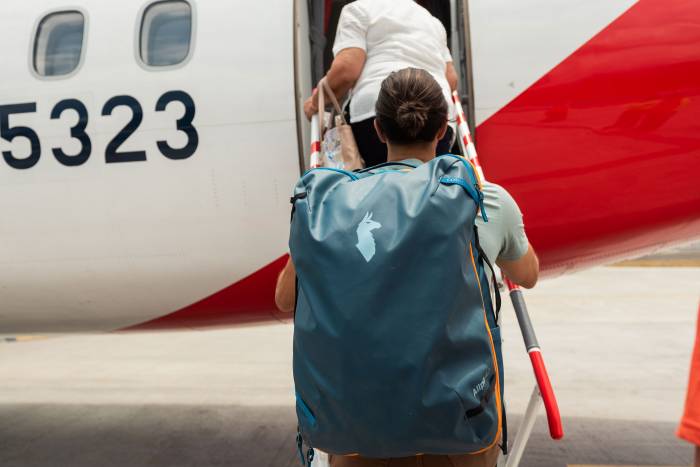 Cotopaxi Allpa 42 boarding plane travel luggage