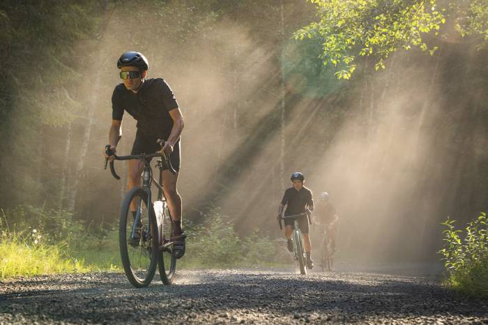Bike rider with a Roval Terra CLX wheelset and reflective sunglasses