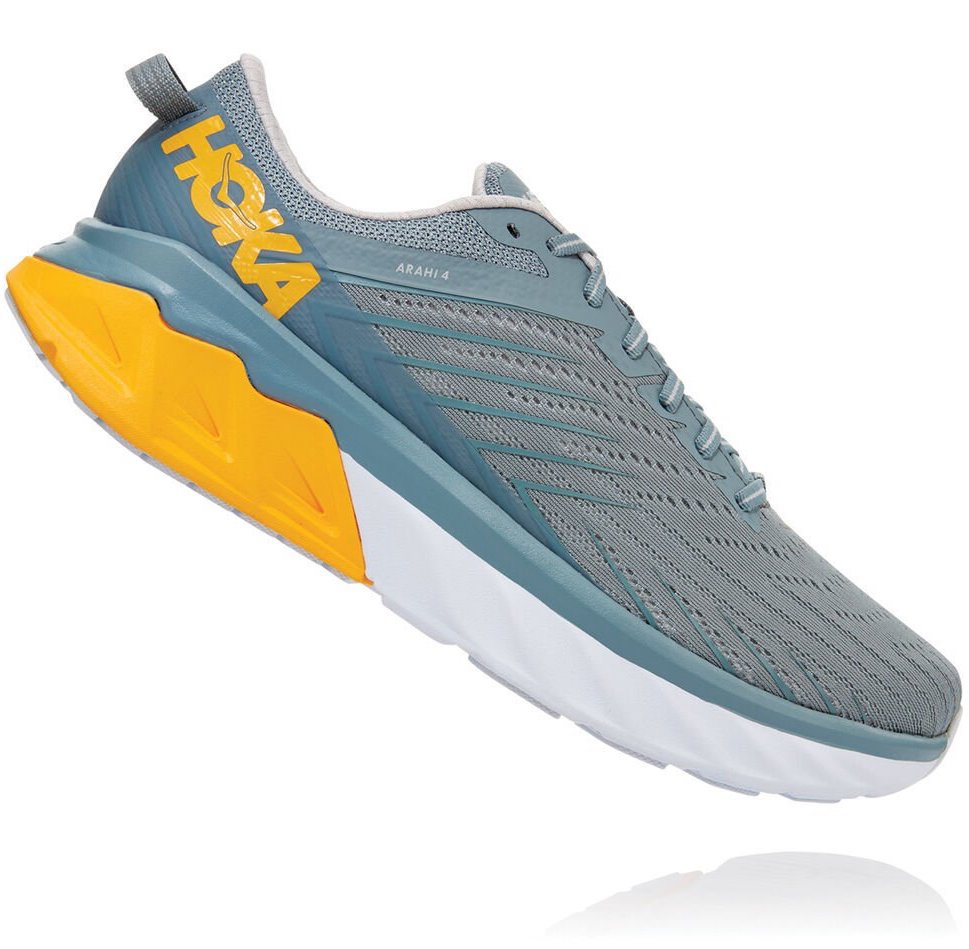 Side profile view of HOKA Arahi 4 running shoe against white background