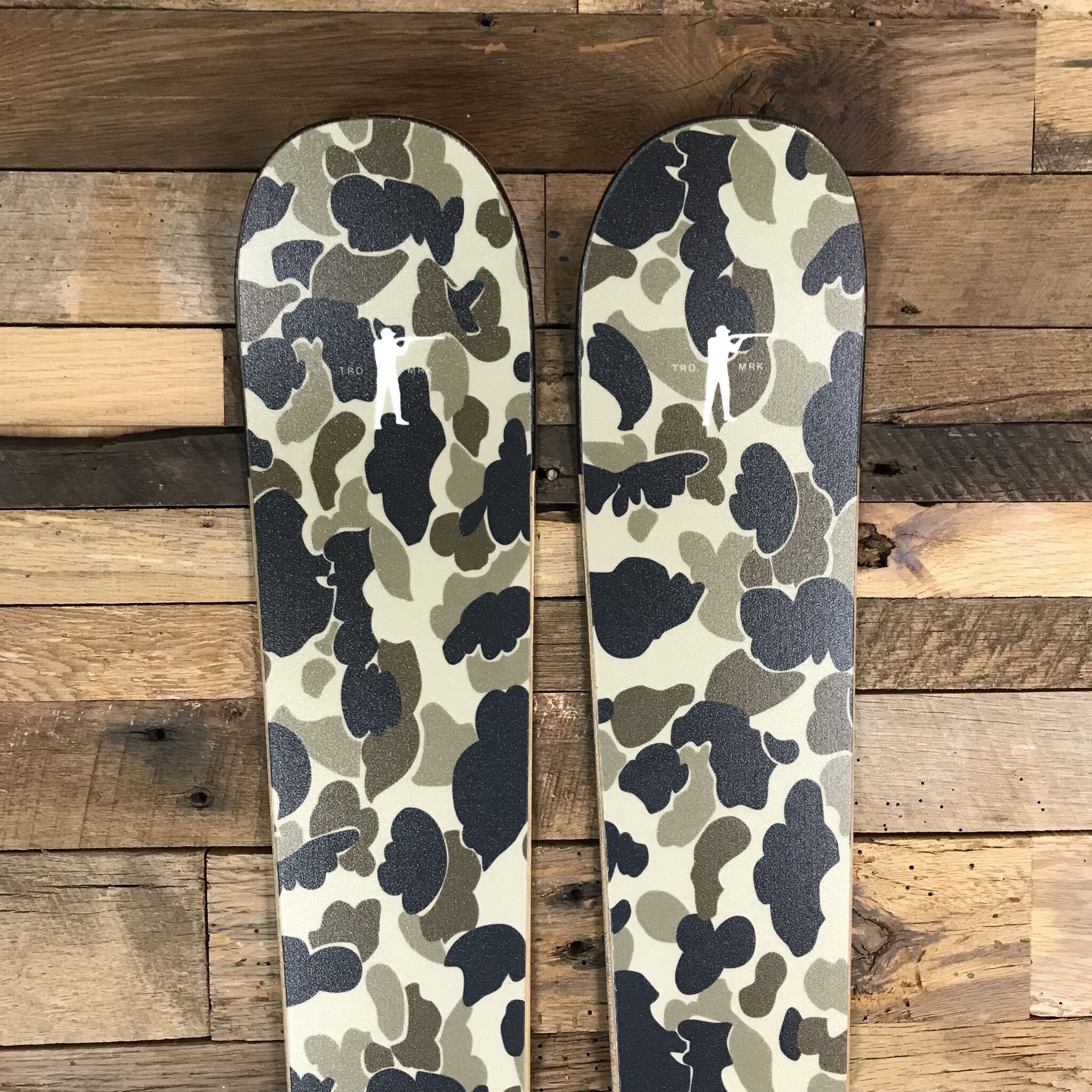 close up view of topsheets on Ball and Buck x Parlor skis
