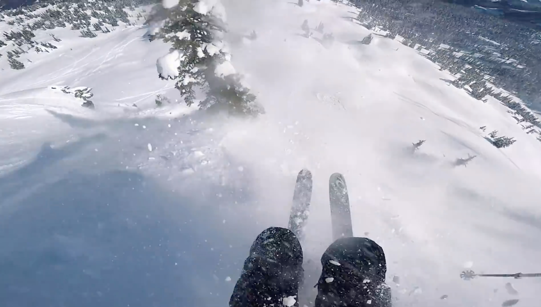 view of skiers legs and feet as they get caught in an avalanche