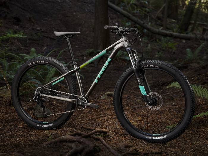 Trek roscoe 6 hardtail bike shown on trail