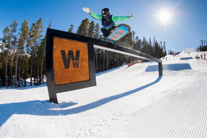 snowboarder riding rail at Eldora Mountain park in Ms. Superpark comp