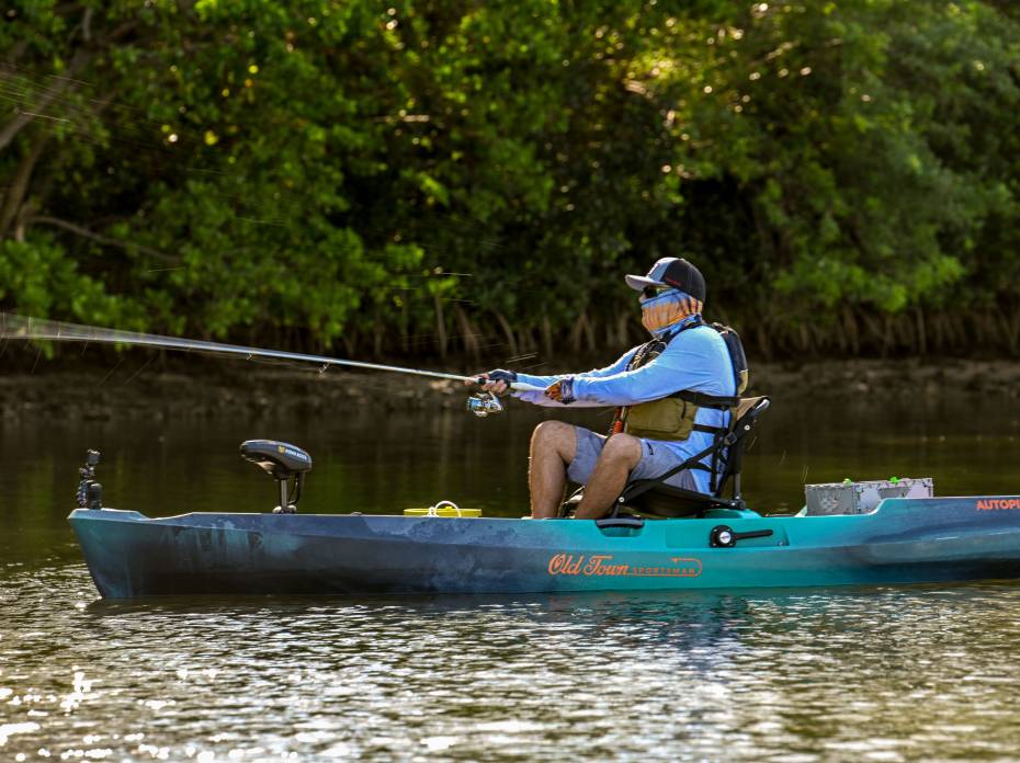 fisherman using OldTown AutoPilot pedal kayak