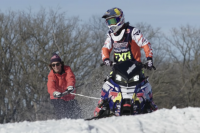 snowboarding off hay bales in Minnesota