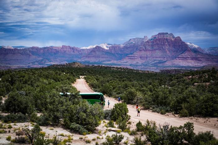 wide shot of bus on dirt road in Bus Run Bus Film