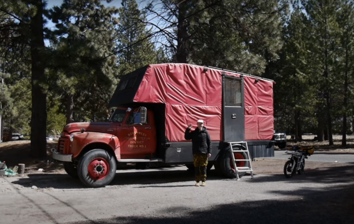 old fire truck built into a duffel bag camper