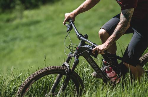 Person riding a Santa Cruz Mountain Bike