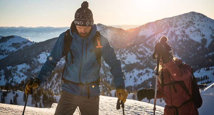 Two Skiers in the Mountains
