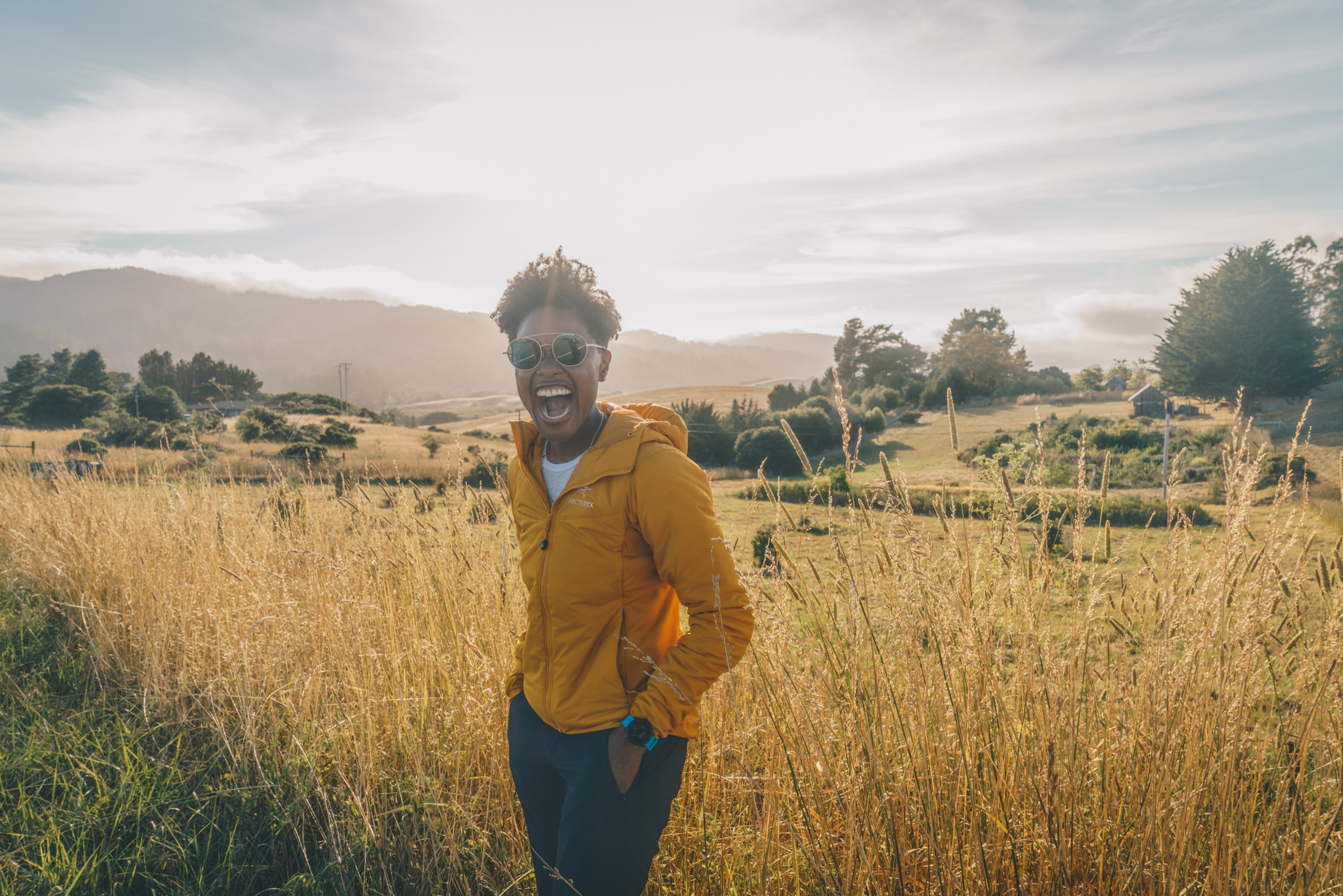 outdoor athlete smiling in field