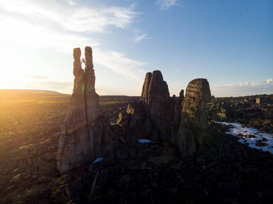 Climbing in Siberia: Team Sets First Ascent on 'Mystic' Granite Towers Kilian Fischhuber climbing towers in siberia