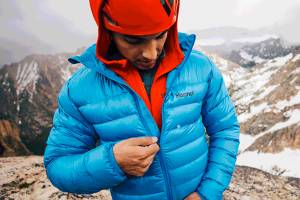 Rock Climber Wearing Marmot Puffy jacket
