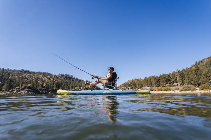 man seated and fishing from the hobie mirage kayak