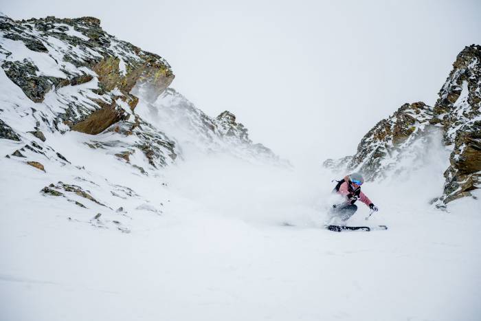 Backcountry Skier Skiing Couloir