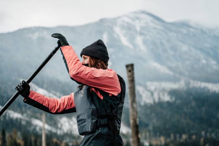Female paddler in beanie in Mustang Helix Drysuit