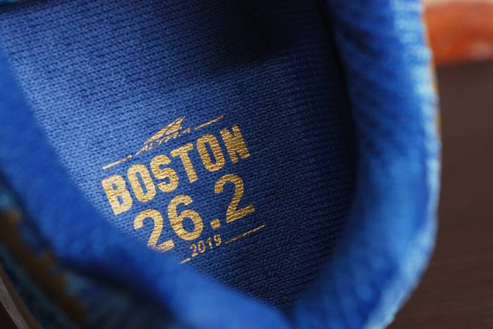 a label on the inside of an Altra Escalante Racer blue Boston Marathon edition shoe