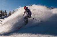Native Skier, Snowboarder Invite You to Share Their 'Connection' With the Mountains Lahota skier connor ryan skiing downhill through powder at Eldora Mountain