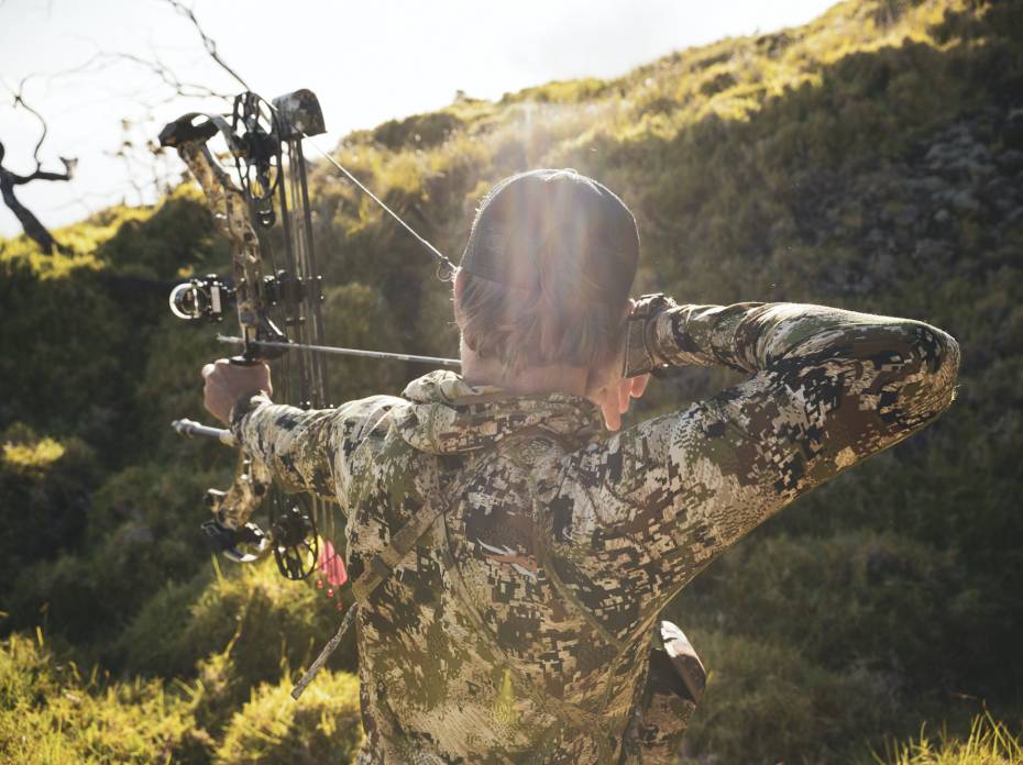 Sitka Gear Recruits Bowhunter, Big-Wave Surfer for 2-Part Film Series Mark Healey bow hunting in Hawaii