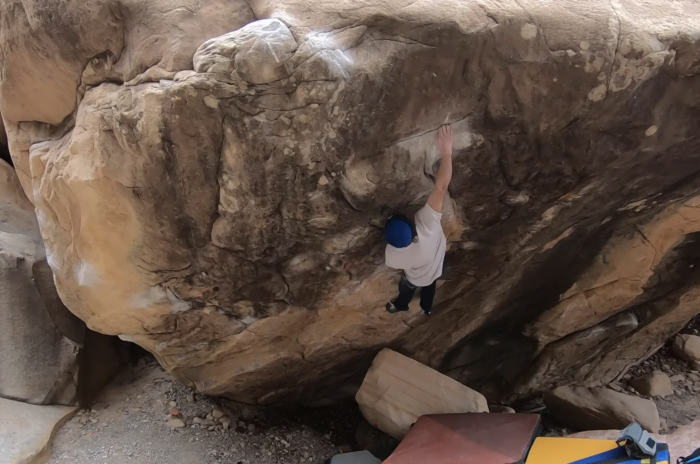 daniel woods climbing on "Sleepwalker" v16 boulder problem