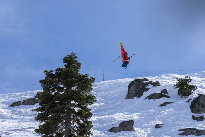 skier doing trick off rock at Red Bull Raid