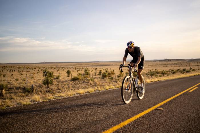 Colin Strickland riding on pavement road