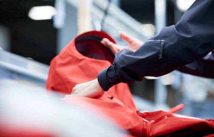 Arc'teryx shell fabric being assembled