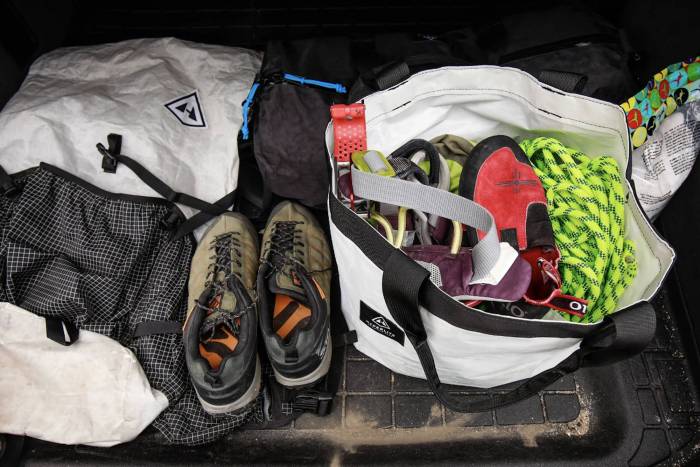 Hyperlight Mountain Gear tote with climbing gear, shoes, and pack in trunk