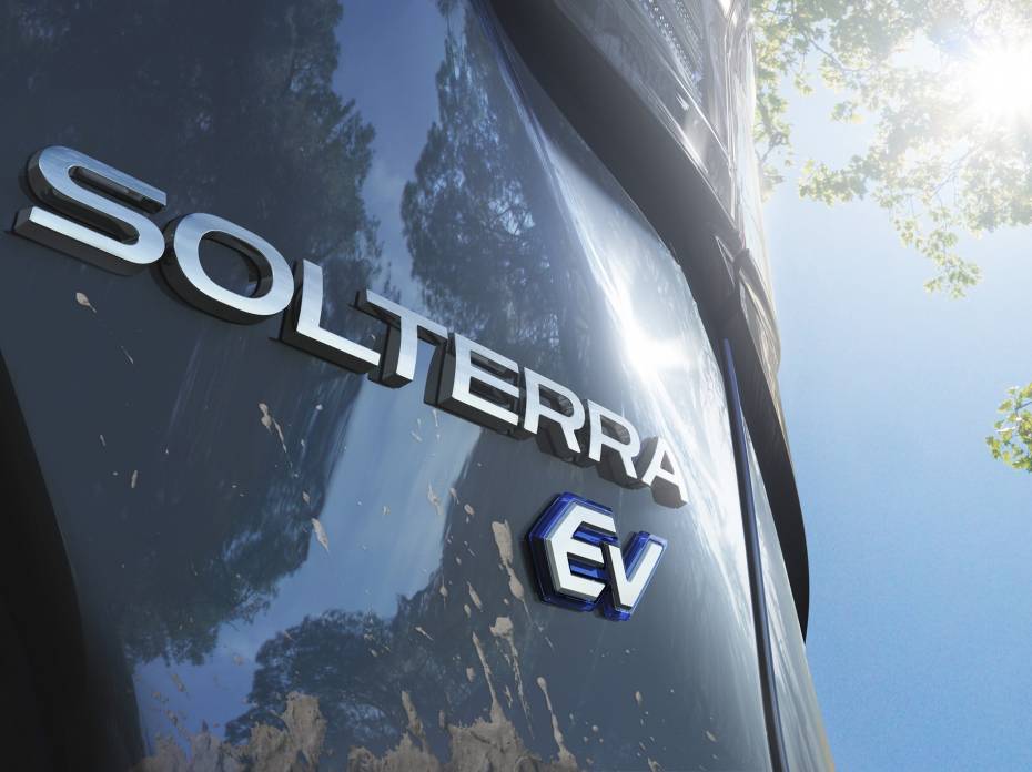 Subaru of America Announces First Electric Vehicle, the Solterra Solterra Subaru logo on close up of SUV