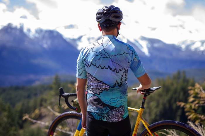cyclist in Kate Zessel artist jersey in BC, Canada