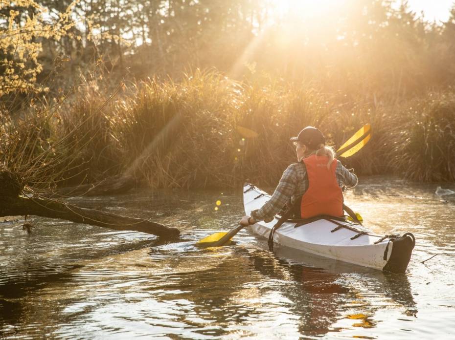 Pushing Limits Outdoors: Danner Boots Wants You to ‘Go There’ Photographer Mo Heim kayaking at dawn