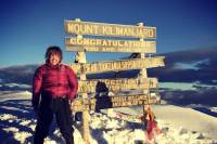 'TranSending': Erin Parisi Pushes Toward First Trans Ascent of All Seven Summits Erin Parisi on Mt. Kilimanjaro