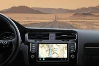 Gaia GPS Brings In-Car Backcountry Navi to Android Auto Gaia GPS app on screen dash in car looking out on desert back road
