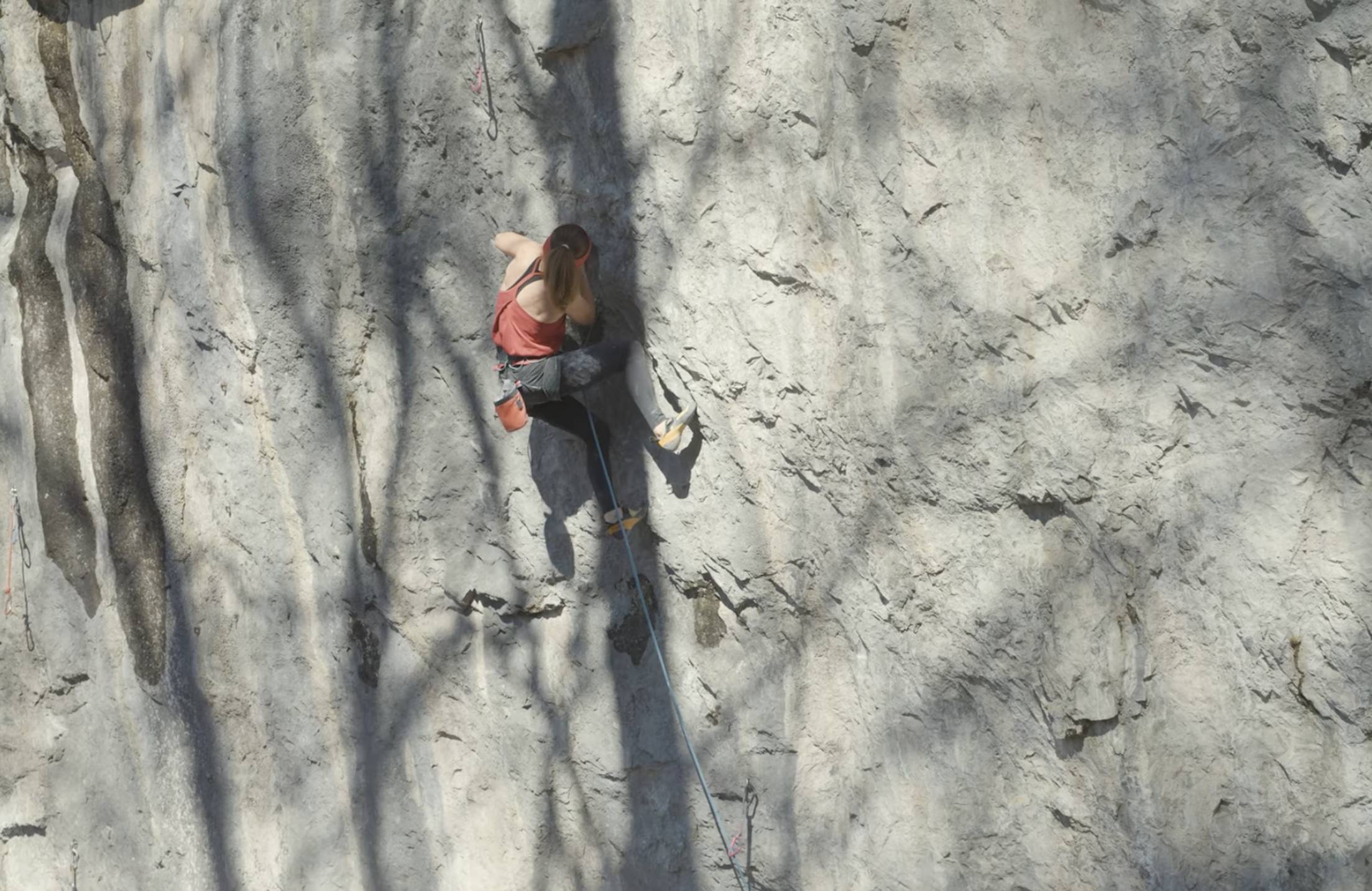 babsi zengerl climbing a 9a route in Austria