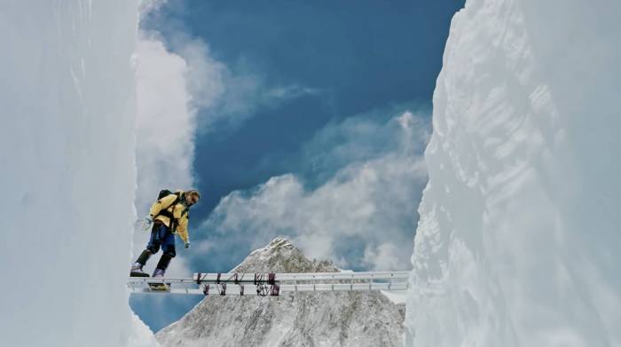 Everest guides crossing a bridge near Camp II of Everest